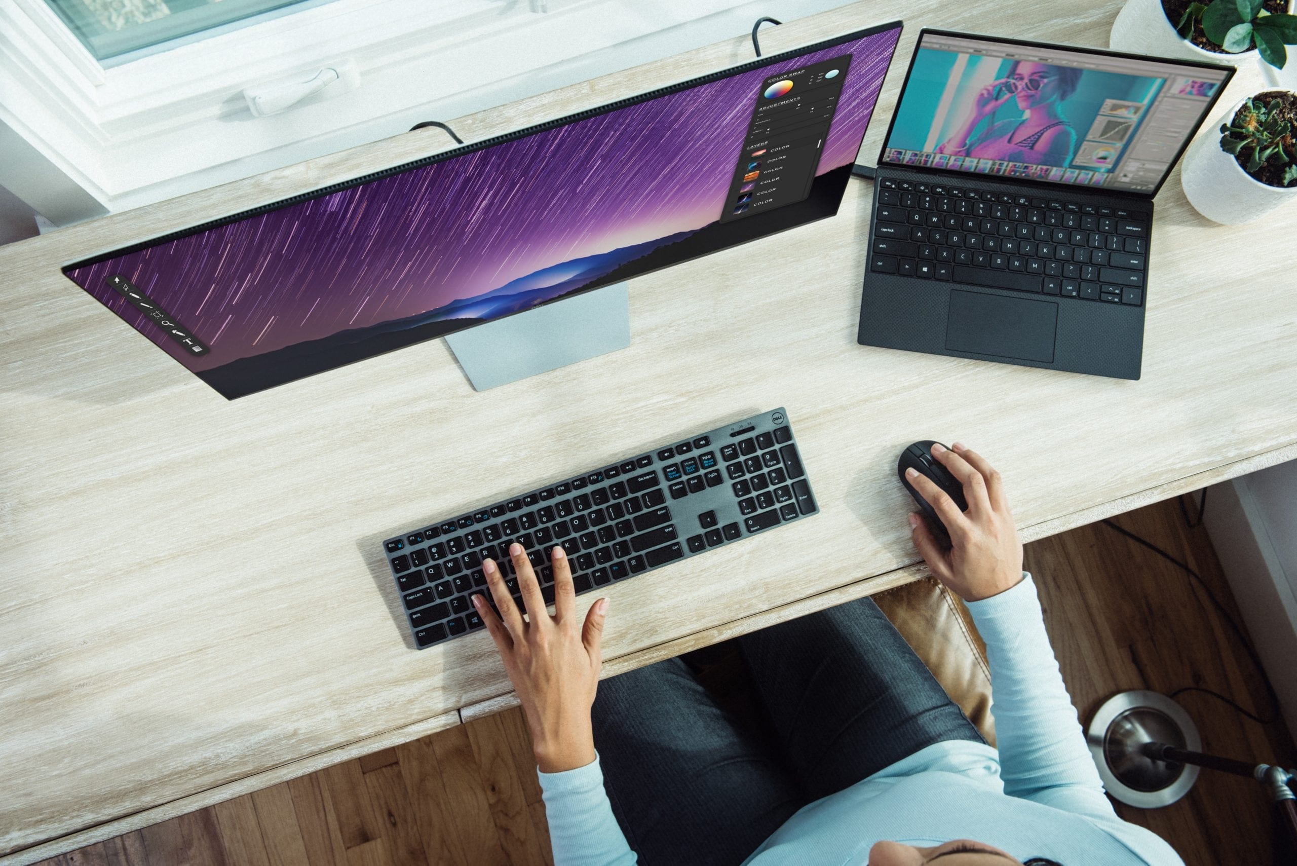 Photo by XPS person using laptop on table